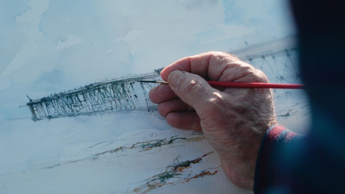 aging hand painting the pier in watercolours